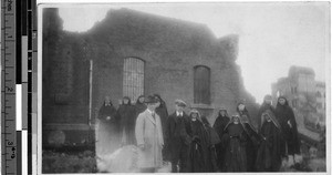 Group touring earthquake-damaged Yokohama, Japan, ca. 1923