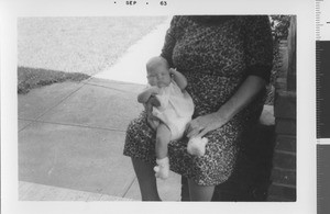 Woman holding baby