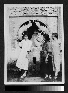 Three women pose at shrine, Sichuan, China, 1926