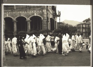 Chinese funeral in Kowloon. Photograph by Rev. Weickum, Fopin. A group of mourners