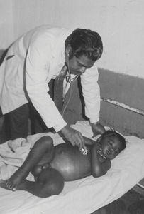 East Jeypore, Orissa, India. Dr. Virendra Kumar Henry examining a patient at Christian Hospital