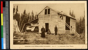 Missionary fathers building a wooden house, Canada, ca.1920-1940