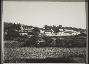 Mission station Longheu. Mission house (on the left) and girls' boarding school (on the right)