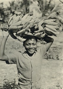 Boy with bananas, in Gabon