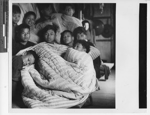 A group of boys in blankets at Wuzhou, China, 1950