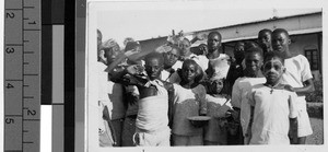 Group of children after a play, Africa, March 1947