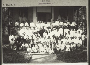 Congregation in Mengatip (on the left Rev. Kühnle with his wife and child