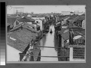 Canal and houses in Suzhou, China, ca.1920-1930