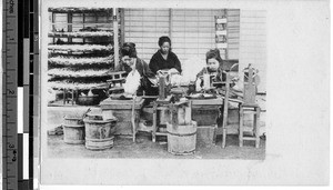 Three women sewing outside, Osaka, Japan, May 22, 1911