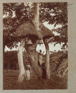 Two African boys ringing bells, Mwika, Tanzania