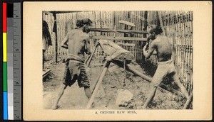 Two men using a hand saw, Shantou, Guangdong, China, ca.1920-1937