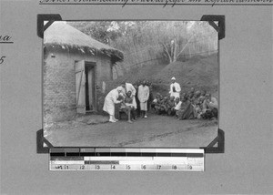 Lepers with medical staff, Isoko, Tanzania, 1929