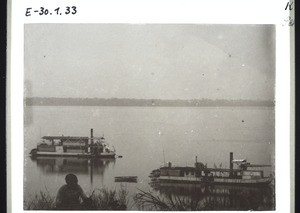 Government boats plying along the coast and in the river - Mungo on the left, Soden on the right