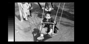 Children playing on swings, Chengdu, Sichuan, China, ca.1945