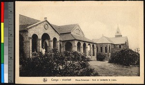 Mission housing standing near a chapel, Congo, ca.1920-1940