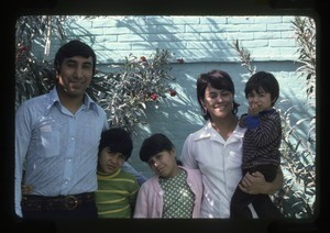 Family outside their home