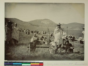 Carriers with oxen hide on their way to Toamasina, Soavina, east from Antananarivo, Madagascar, 1895