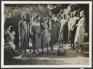 African women drinking beer, Tanzania