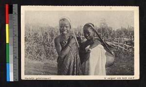 Two girls carrying clay jugs, Congo, ca.1920-1940