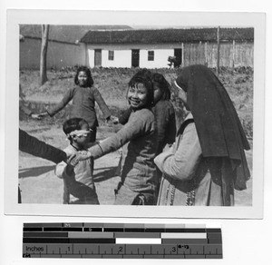 Sister and children in Guilin, China, 1947