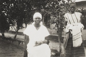 Nurse Elfrida with premature baby, Nigeria, ca. 1934