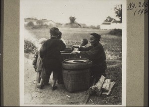 Children buying ground-nuts