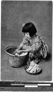 Girl washing towels, Japan, ca. 1920-1940