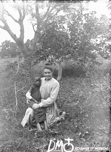 European woman with an African child, Khovo, Maputo, Mozambique, ca. 1896-1911