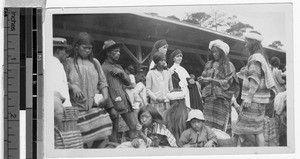 Maryknoll Sisters Lucy and Celeste standing among indigenous people in a market, Baguio, Philippines, March 24, 1935