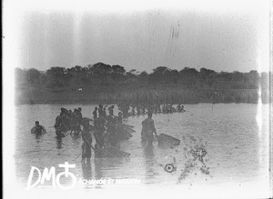 African people fishing with baskets, Makulane, Mozambique, ca. 1896-1911