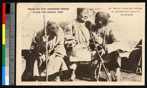 Three elderly Chinese women seated outdoors, ca. 1920-1940