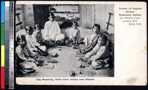 Students and their teacher making clay models, Chennai, India, ca.1900-1920