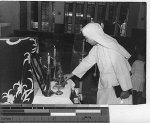 Mother General offers incense at Shenyang, China