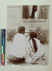 Women braiding hair, Antananarivo, Madagascar, ca.1900