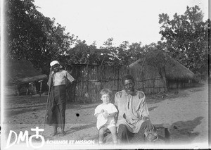 African couple and missionary's child, Ricatla, Mozambique, ca. 1924