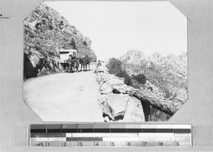 Horse carriage with a man and a woman on Sir Lowry's Pass, between Cape Town and Genadendal, South Africa