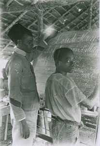 Lance corporal teaching french, in Cameroon