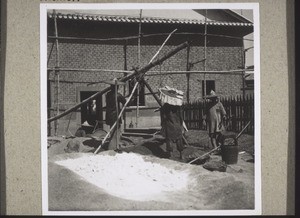 Weighing river sand