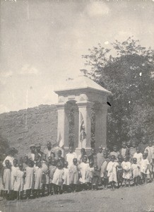 Children of the Sunday school in front of the bell tower at Leloaleng