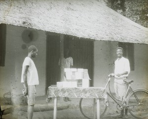 Colportage. Book display in village, Congo, ca. 1900-1915