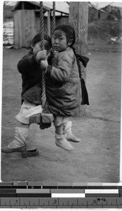 Girls on swing, Gishu, Korea, 1925