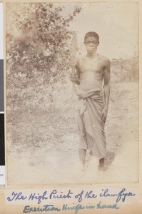 The high priest of the ilamfya with execution knife in hand