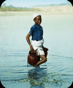 Holy water at Mela, India, ca. 1930