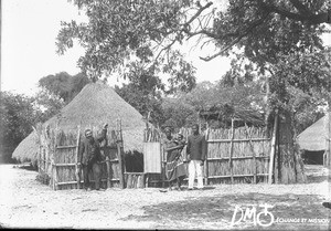 Arnold Borel with an African family, Ricatla, Mozambique, ca. 1896-1911