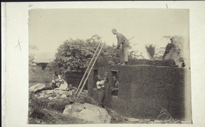 Building a house. Walls made out of stamped earth