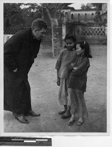 Fr. John McLoughlin at Wuzhou, China, 1948