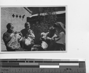 Nurses with creche babies at Fushun, China, 1940