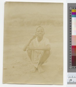 Boy cleaning his teeth, Malawi, ca.1910