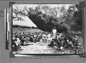 Women processing coffee cherries, Kyimbila, Tanzania, ca. 1898-1914