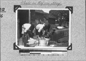 Africans washing clothes, Mbozi, Tanzania